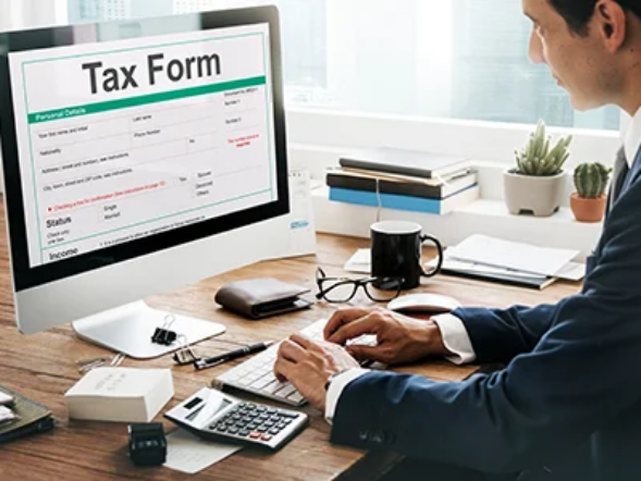 Person reviewing tax forms